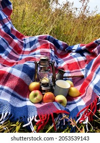 Beautiful Autumn Composition With Vintage Lantern, Mug, Coffee Turk, Blue Red Wool Blanket, Apples And Pears