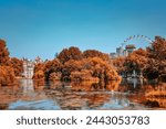 Beautiful autumn landscape in St James Park with London Eye in the background