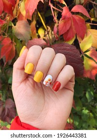 Beautiful Autumn Manicure Design On Well-groomed Female Nails. Soft Square Shape. Fall Leaves