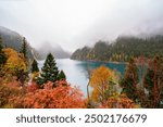 Beautiful autumn scenic view at Long lake in jiuzhaigou national park