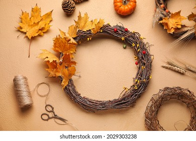 Beautiful Autumn Wreath With Craft Supplies On Color Background