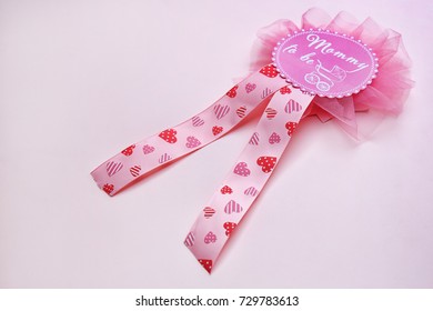 Beautiful Award Ribbon For Baby Shower Party On Color Background