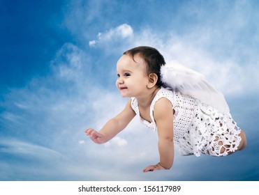 Beautiful Baby Angel Sitting On Clouds Stock Photo (Edit Now) 145081810