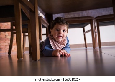 Beautiful Baby Boy Under The Table