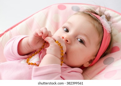 Beautiful Baby Girl Chewing Amber Teething Necklace