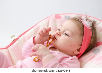 Beautiful Baby Girl Chewing Amber Teething Necklace