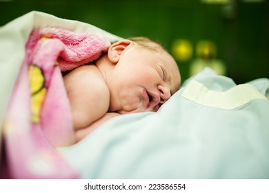 Beautiful Baby Girl Few Minutes After The Birth Lying On Her Mother, Skin To Skin Contact