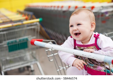 Beautiful Baby Girl In Shopping Cart - Trolley