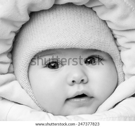 Similar – Baby girl wrapped in a blanket