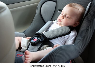 Beautiful Baby Sleeping In Car Seat