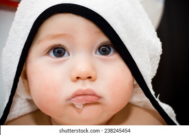 Beautiful Baby Wrapped In A White Towel