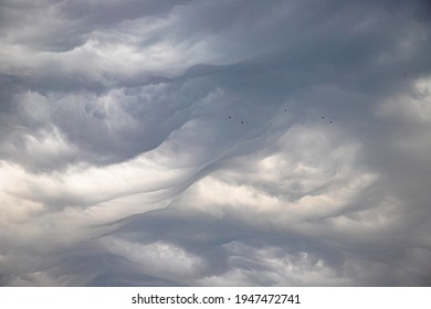 beautiful background with dramatic  clouds.abstract style of text design.with added noise and grains.