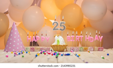 Beautiful Background Happy Birthday Number 25 With Burning Candles, Birthday Candles Pink Letters For Twenty Five Years. Festive Background With Balloons