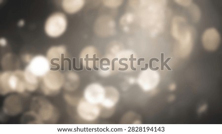 A beautiful background image featuring soft focus golden bokeh lights creating a dreamy and magical atmosphere, perfect for festive or elegant designs.