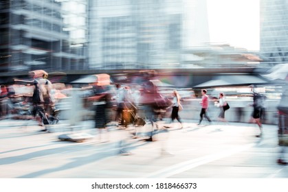 Beautiful Background With Motion Blur People. People Walking In The  City Of London In Early Morning. People Rushing To Work. London, UK