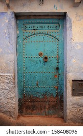 beautiful background and texture green-blue door at sidewalk, old town, Morocco