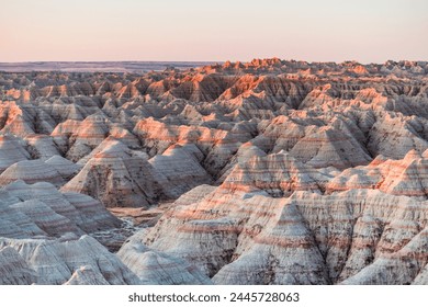 The beautiful Badlands National Park in South Dakota with sunset view in the background - Powered by Shutterstock