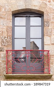 Beautiful Balcony With Red Metal Bannister