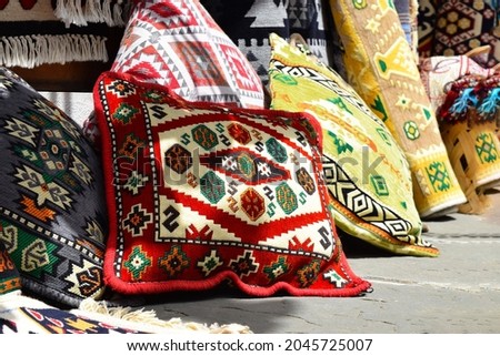 Beautiful Balkan pillows with embroidery at the Turkish bazaar in Gjirokastra, Albania, Europe