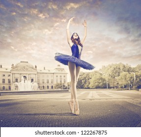 Beautiful ballerina dancing on a street - Powered by Shutterstock