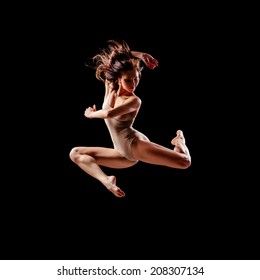 Beautiful Ballet Dancer Posing On Black Studio Background