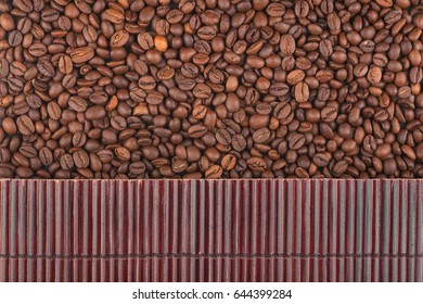 Beautiful bamboo mat on coffee beans as agricultural background. View from above