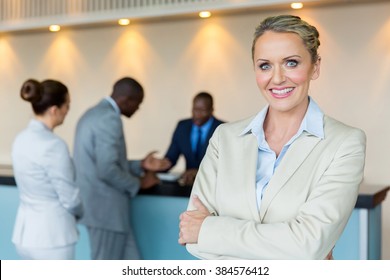 Beautiful Bank Manager With Customers On Background