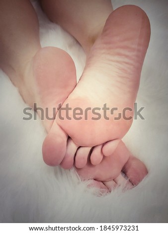 Beautiful bare feet with long toes