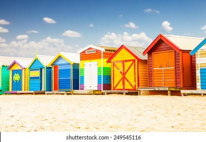 Beautiful Bathing houses on white sandy beach at Brighton in Melbourne, Australia.
