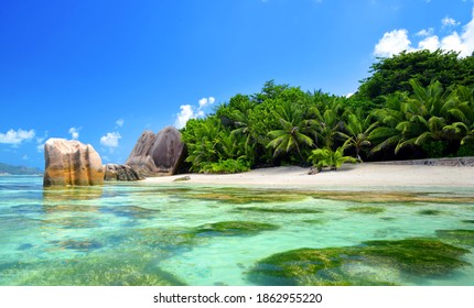 Beautiful Beach Anse Source D'Argent With Big Granite Rocks In Sunny Day. La Digue Island, Seychelles. Tropical Destination.