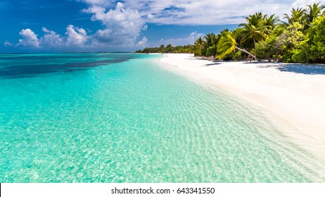 Beautiful Beach. Idyllic tropical beach landscape for background or wallpaper. Design of tourism for summer vacation holiday concept. - Shutterstock ID 643341550