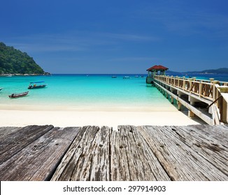 Beautiful beach and old wooden pier at Perhentian islands, Malaysia