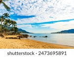 Beautiful beach on the island of Ilhabela on the north coast of Sao Paulo with the mountains in the background