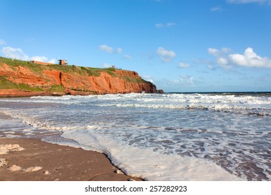 Beautiful beach and red cliffs at Sandy Bay Exmouth Devon England UK Europe