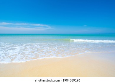 Beautiful Beach And Sea. Sand On Sea Water Clear. Blue Sea Blue Sky Background.