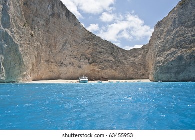 beautiful beach surrounded by cliffs