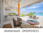 Beautiful beachfront and blue sky beach. Luxury tropical landscape from private villa with deck chairs table loungers and sea water. Summer travel vacation landscape. Carefree tourism home office view