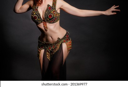 Beautiful belly dance movement, arabian bellydancer. exotic female. perfect body lady. studio. isolated.