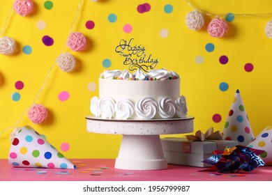 Beautiful Birthday Cake And Decor On Pink Table