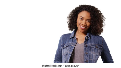 Beautiful Black Girl In Denim Jacket Smiling At Camera On White Background