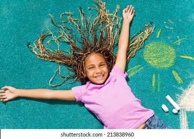 Beautiful Black Girl With Her Chalked Drawing