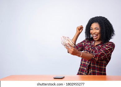 Beautiful Black Lady Holding Some Cash Feeling Excited And Happy