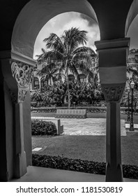 A beautiful black and white picture of Boca Raton Resort and Club garden showing the details of columns and seats in the garden in Boca Raton Florida on August 8 2017.