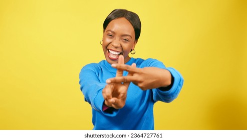 Beautiful Black woman dancing with hashtag symbol, social media campaign yellow - Shutterstock ID 2364727761