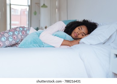 Beautiful Black Woman Lying Down On Bed Sleeping