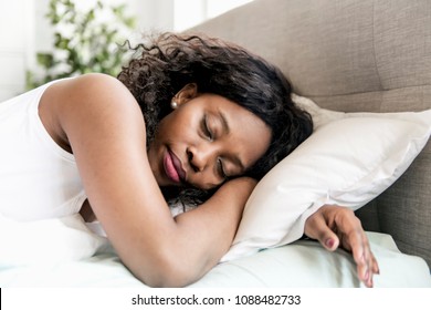 Beautiful Black Woman On A White Bed Sleep