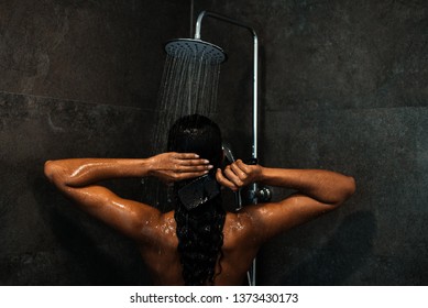 Beautiful Black Woman At The Shower At Home