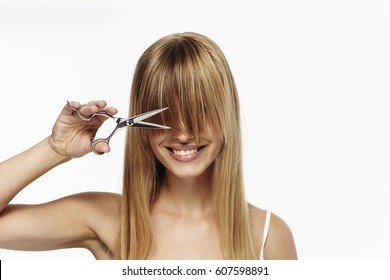 Beautiful Blond About To Cut Hair, Studio