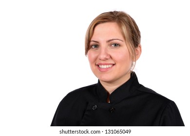 Beautiful Blond Wearing Black Chef Coat In The Restaurant Food Server Industry. In Studio On White Background.