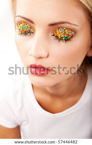 beautiful  blond woman with bright easter makeup